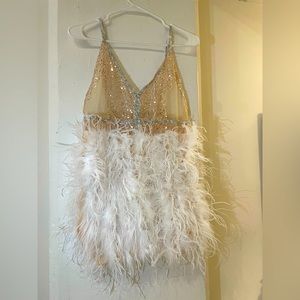 See through sequin bodice, feather fringe bottom